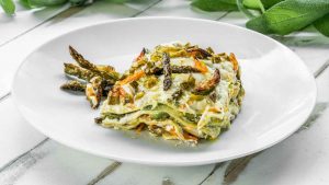 Una gustosa porzione di lasagna agli asparagi. - Improntaunika.it